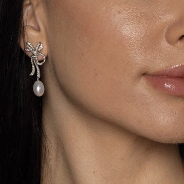 Tukah Erring with pearl collection